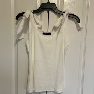 White tank top with bow ties on shoulder.